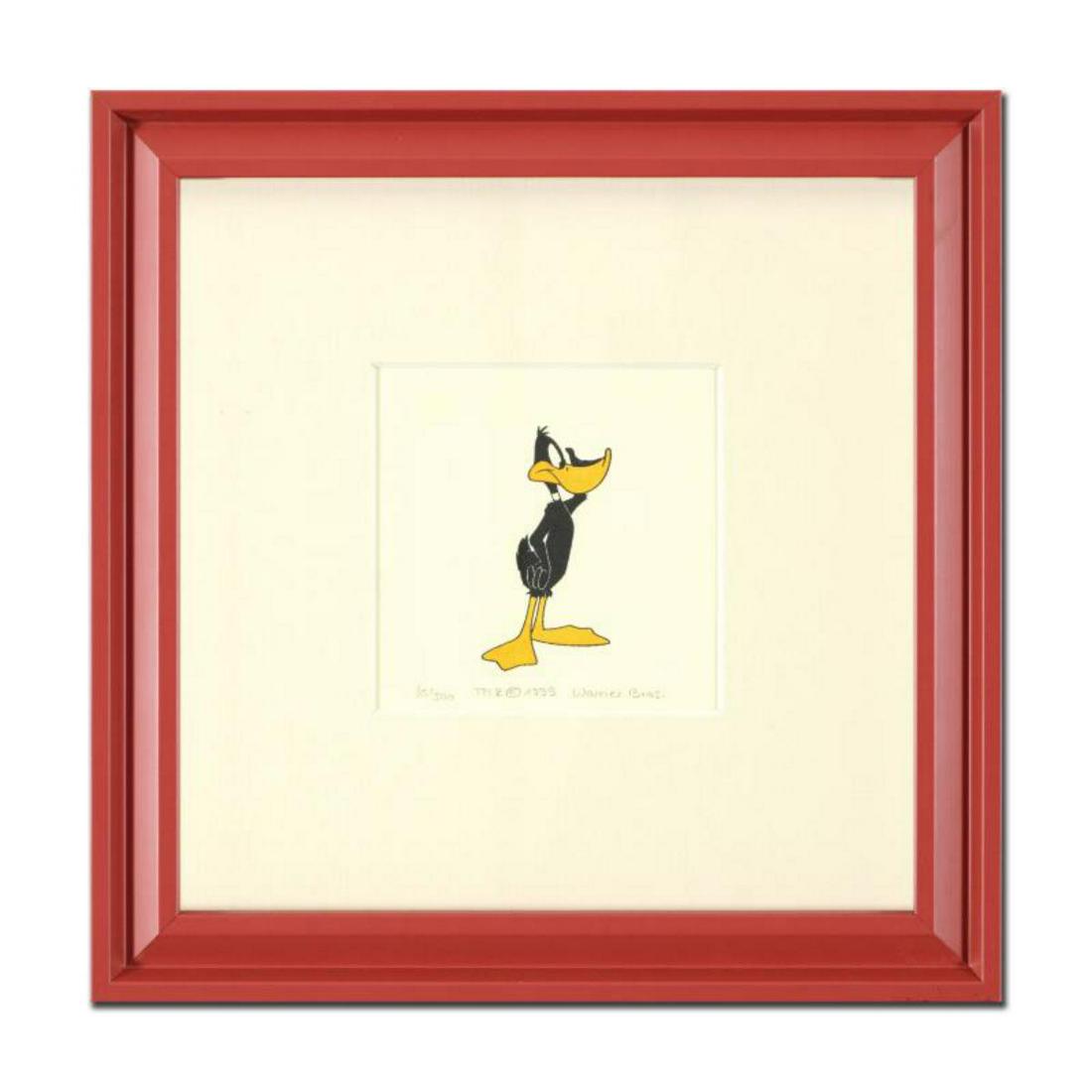 "Daffy Duck" Framed Limited Edition Etching with: "Daffy Duck" is a limited edition etching on paper with hand-tinted coloring from Warner Bros, numbered and dated 1999. This piece comes framed. Measures approx. 9" x 9" (with frame), 1.5" x 2.5" (ima