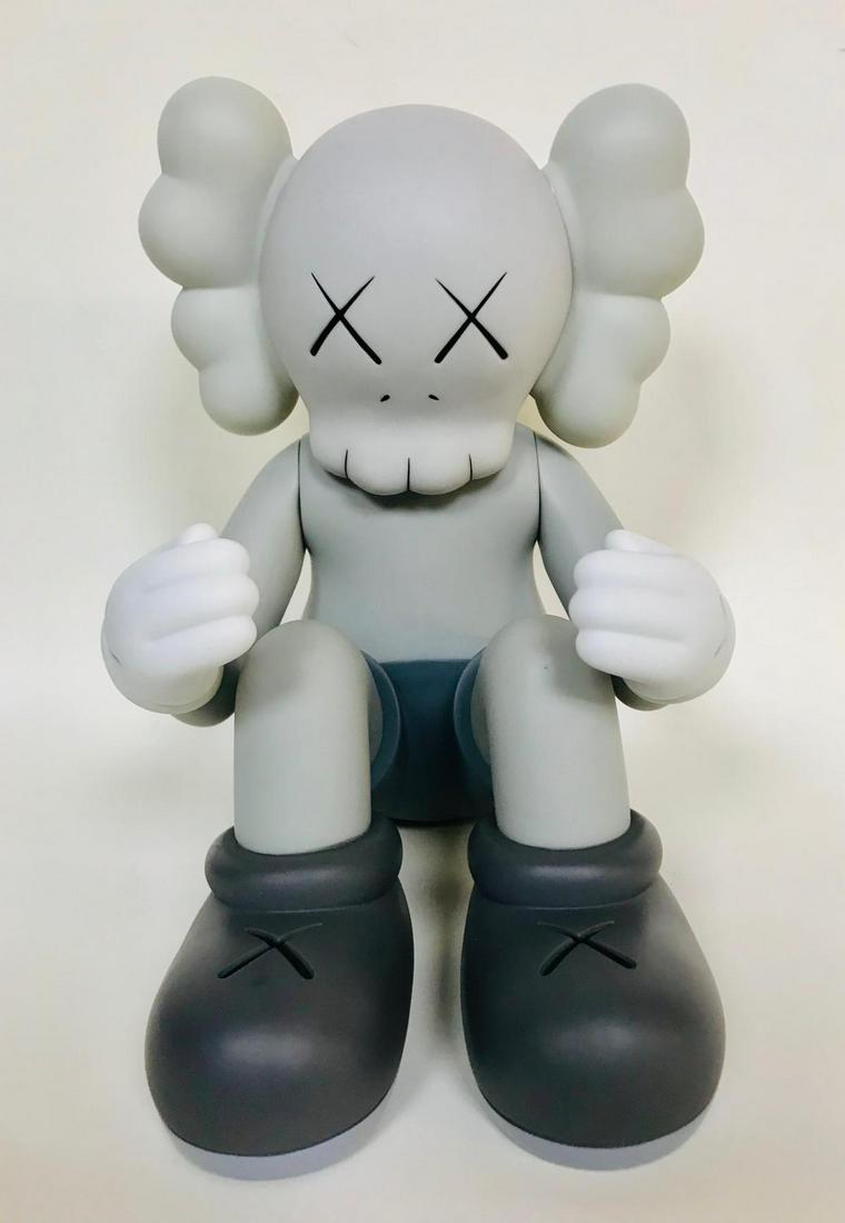 KAWS "Seeing /Watching" Vinyl Figure In the Manner Of: Artist: KAWS. Title: "Seeing /Watching". Medium: Vinyl Figure. Size: 9x9x7". In the Manner Of. From private collection. Sold as is.
