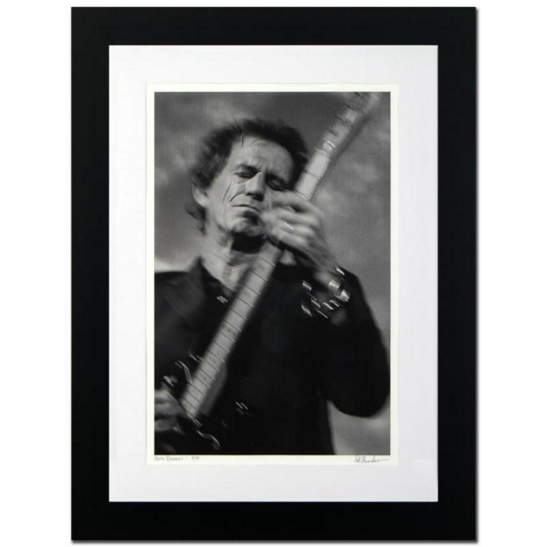 "Keith Richards" Limited Edition Giclee by Rob: "Keith Richards" is a limited edition giclee on paper, numbered and hand signed by acclaimed music industry photographer Rob Shanahan. This piece comes custom framed. Includes Certificate of Authentic