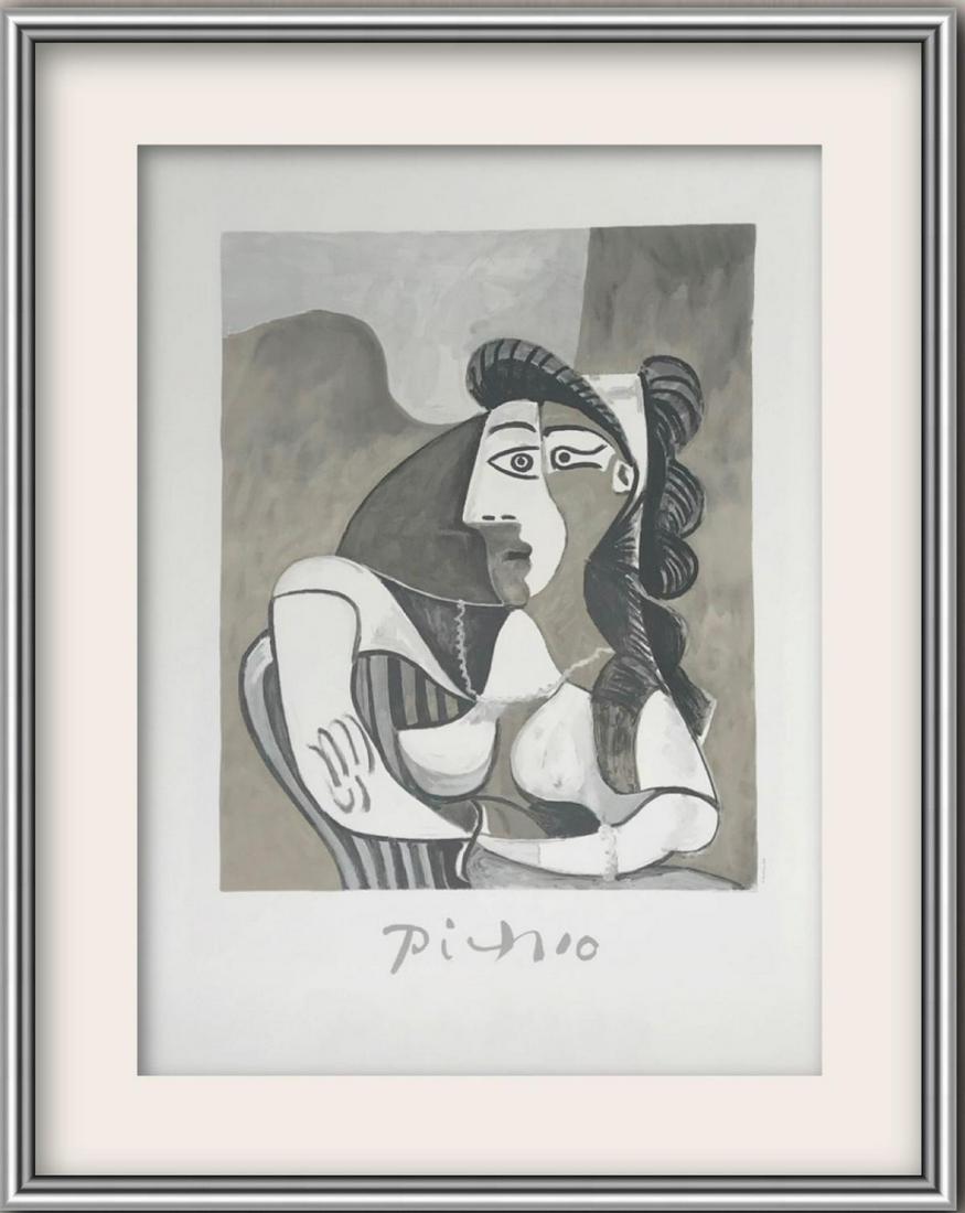 Pablo Picasso- Lithograph on Arches Paper "Femme: Artist: Pablo Picasso. Medium: Lithograph on Arches Paper. Title: Femme Accoudee au Fauteuil. Size (Unframed): 29" x 22". Size (Framed): 40" x 30". Certificate of Authenticity: Is included. Additional