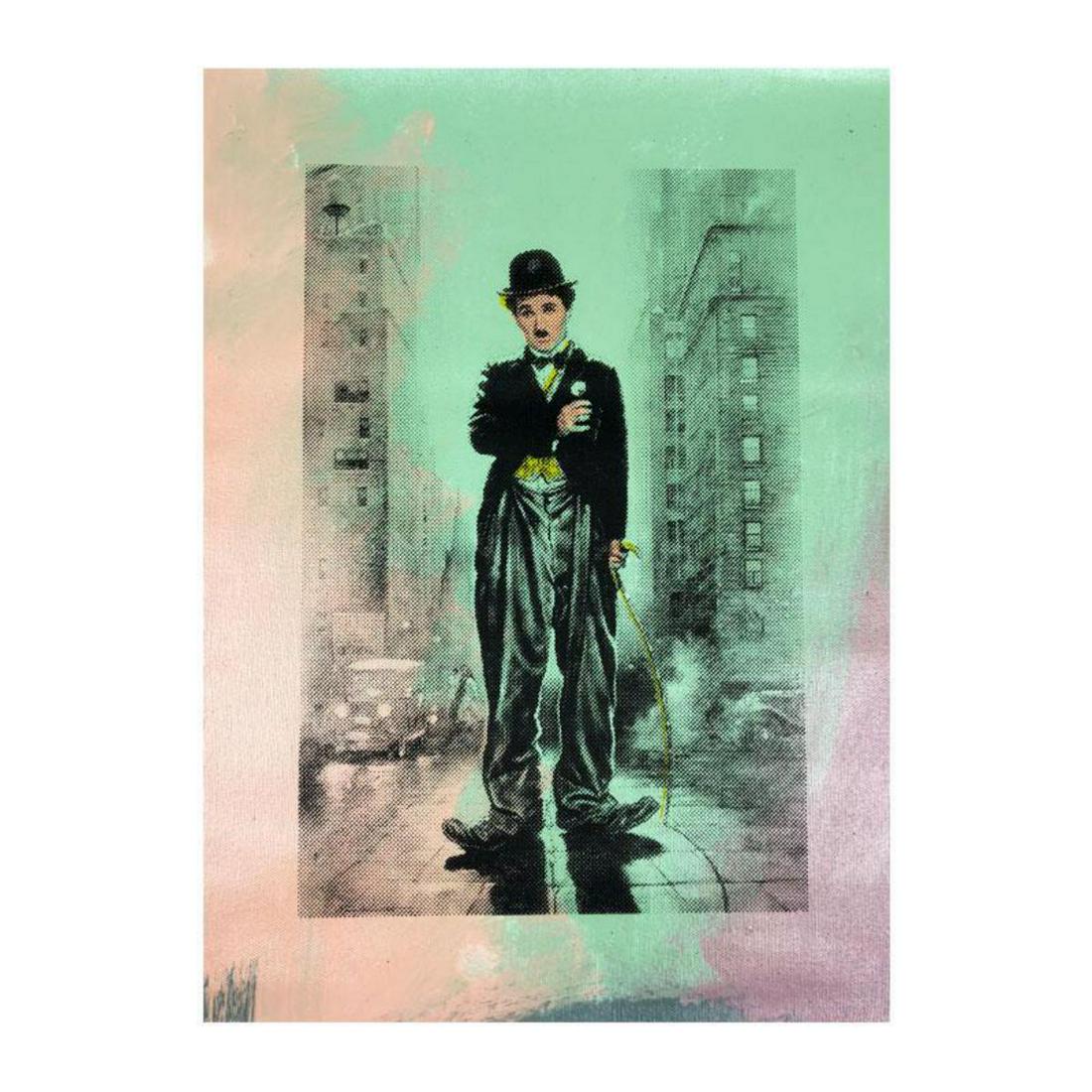 Steve Kaufman (1960-2010), "Charlie Chapin" Hand Signed: "Charlie Chapin" is a limited edition hand pulled silkscreen mixed media on canvas by Andy Warhol protege Steve Kaufman (1960-2010). This piece is numbered and 11/50 and hand signed inverso. Includes 