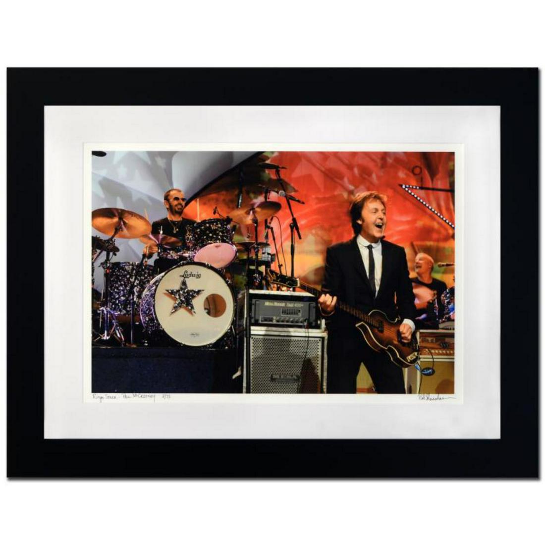 "Ringo Starr & Paul McCartney" Limited Edition Giclee: "Ringo Starr & Paul McCartney" is a limited edition giclee on paper, numbered and hand signed by acclaimed music industry photographer Rob Shanahan. This piece comes custom framed. Includes Certificat