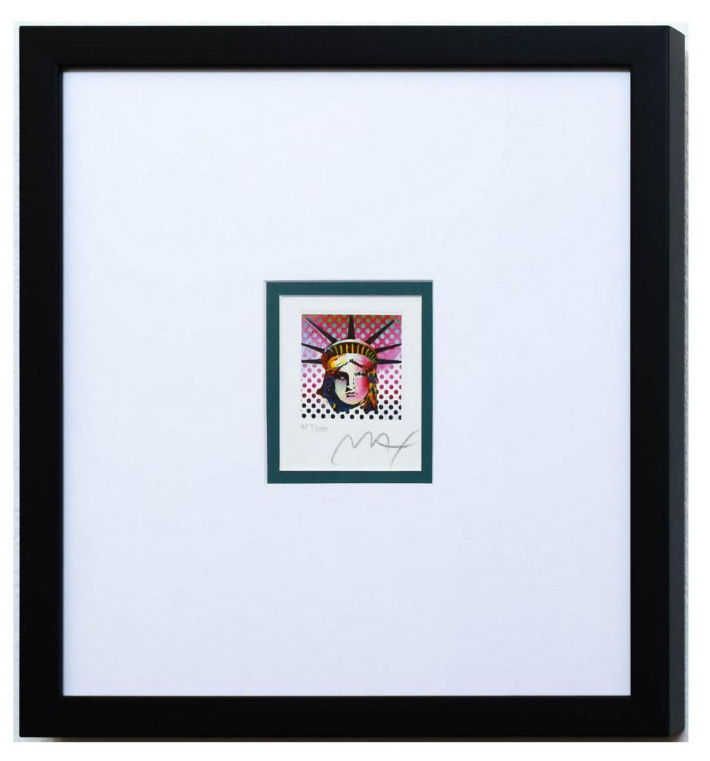 Peter Max- Original Lithograph "Liberty Head II (Mini)": Artist: Peter Max. Medium: Original Lithograph. Title: Liberty Head II (Mini). Size (Unframed): 4" x 3.5". Size (Framed): 14" x 13.5'. Limited Edition: Numbered 457/500. Certificate of Authenticity: F