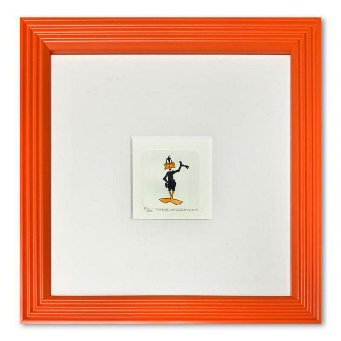 "Daffy Duck" Framed Limited Edition Etching with: "Daffy Duck" is a limited edition etching on paper with hand-tinted coloring from Warner Bros, numbered and dated 1999. This piece comes framed. Measures approximately 9" x 9" (with frame), 2" x 2" (i