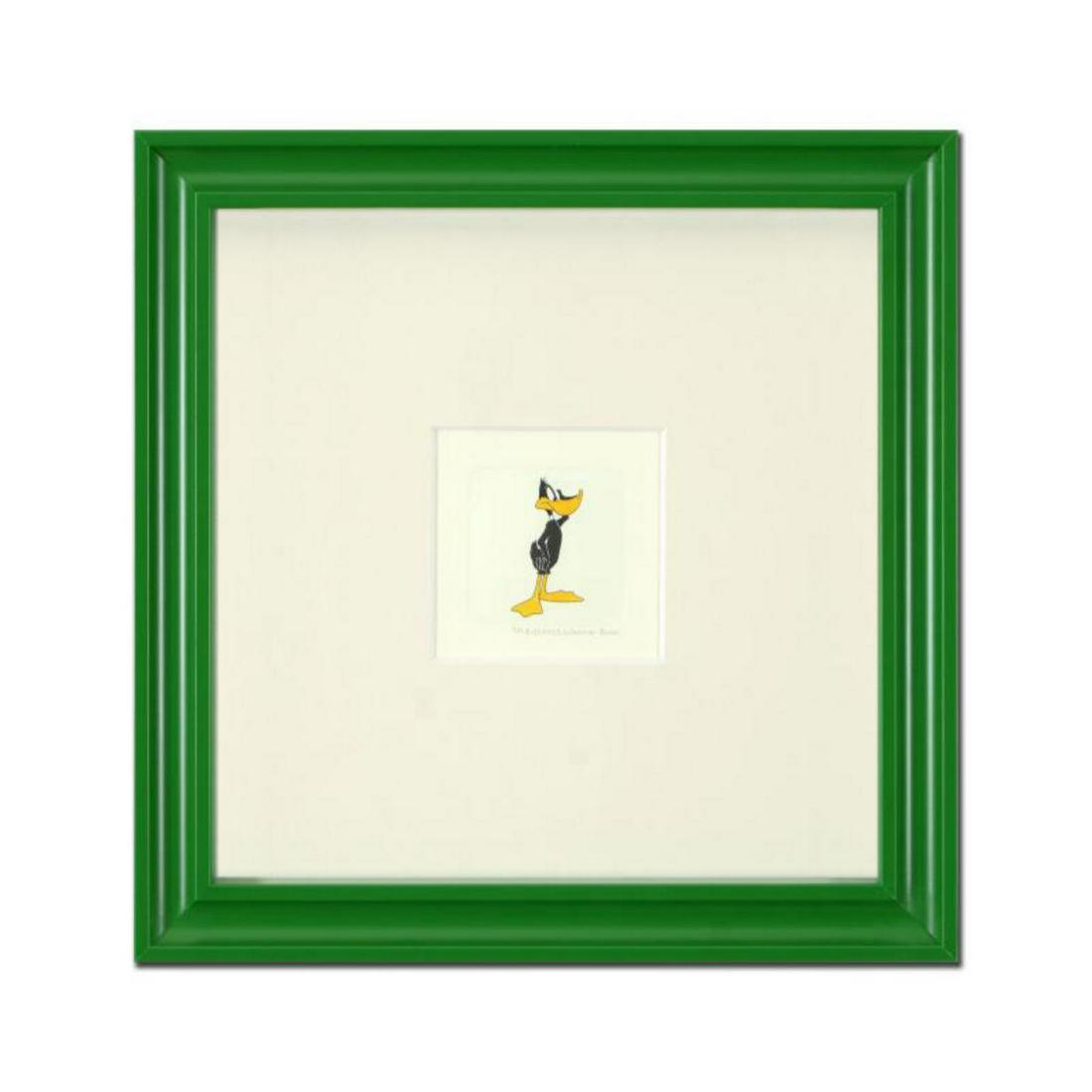 "Daffy Duck (Looking to the Side)" Framed Limited: "Daffy Duck (Looking to the Side)" is a limited edition etching on paper with hand-tinted coloring from Warner Bros, numbered and dated 1999. This piece comes framed. Measures approx. 9" x 9" (with fr