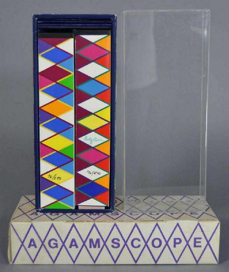 Yaacov Agam Kaleidoscope Devices with silkscreen paper: Artist: Yaacov Agam. Medium: Kaleidoscope Devices with silkscreen paper applied. Hand signed and numbered by the artist in original box. Circa 1990. DIMENSIONS: H 9 in. x W 4 in. x D 2 in. H 22.86 cm 