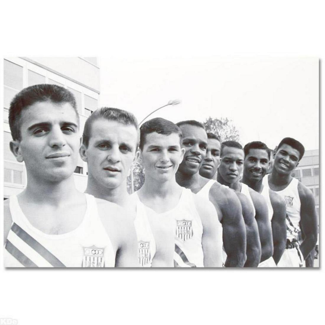 Licensed Photograph of Heavyweight Champ Muhammad Ali.: Own a piece of sports history with this Muhammad Ali photo with fellow Olympians. Taken at the peak of his success as one of the greatest heavyweight championship boxers of all time, this photo is sur