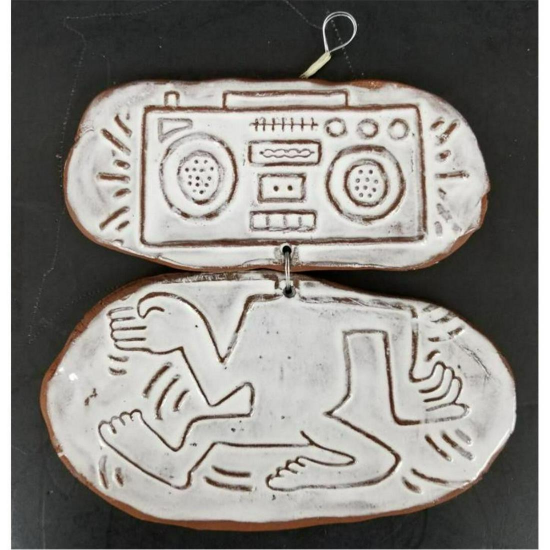 Keith Haring, American ( 1958-1990) Original Ceramic 2: Artist: Keith Haring, American ( 1958-1990). Medium: Original Ceramic 2 Piece Hanging Art Object. Title: Radio Head. Signature: Hand Signed on the Back and Dated 1984. Size: L 7", H 6.5 . Additional: