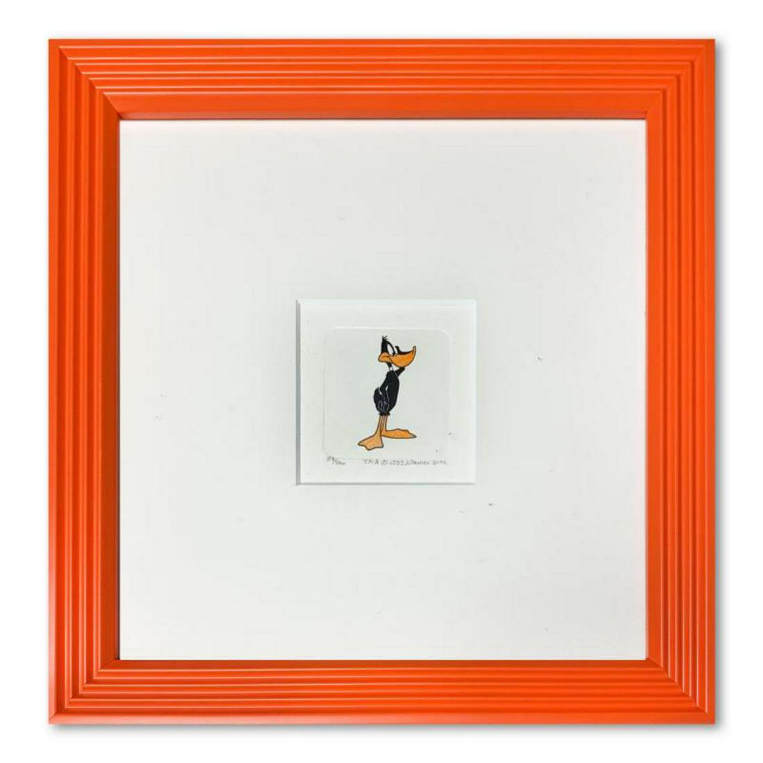 "Daffy Duck" Framed Limited Edition Etching with: "Daffy Duck" is a limited edition etching on paper with hand-tinted coloring from Warner Bros, numbered and dated 1999. This piece comes framed. Measures approximately 9" x 9" (with frame), 2" x 2" (i