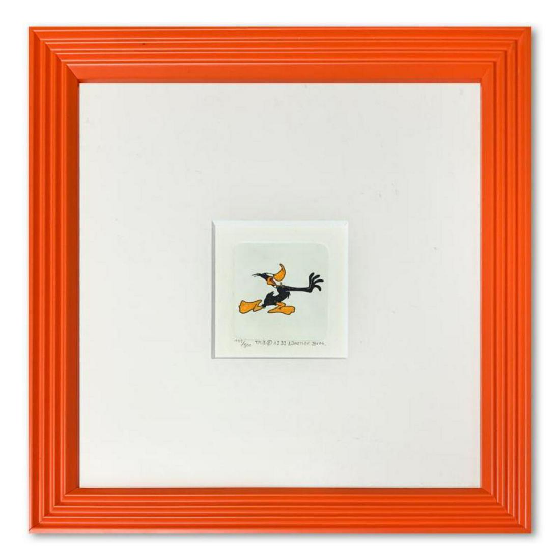 "Daffy Duck" Framed Limited Edition Etching with: "Daffy Duck" is a limited edition etching on paper with hand-tinted coloring from Warner Bros, numbered and dated 1999. This piece comes framed. Measures approximately 9" x 9" (with frame), 2" x 2" (i
