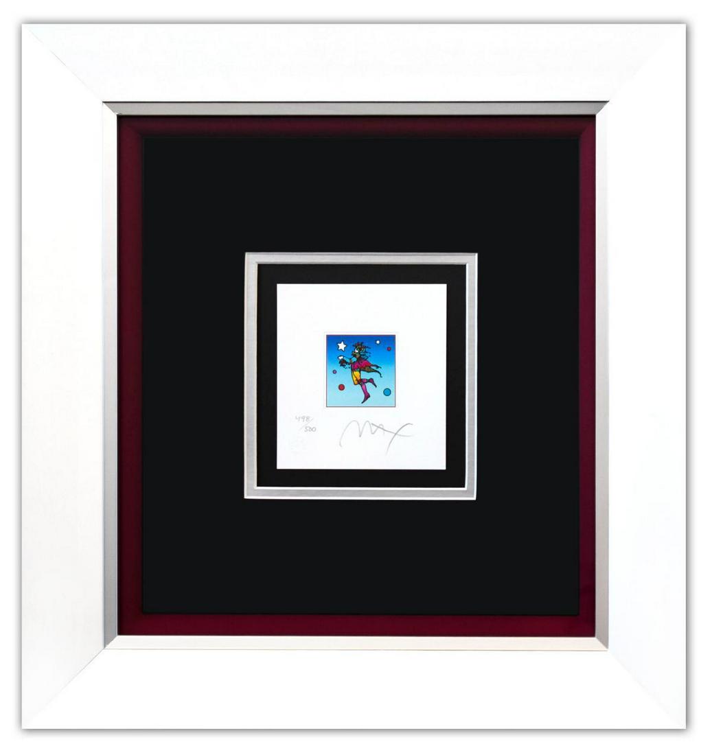 Peter Max- Original Lithograph "Star Catcher on Blue: Artist: Peter Max. Medium: Original Lithograph. Title: Star Catcher on Blue (Mini). Size (Unframed): 4.5" x 4.5". Size (Framed): 17.5" x 18.5". Certificate of Authenticity: From Peter Max Studio. Addi