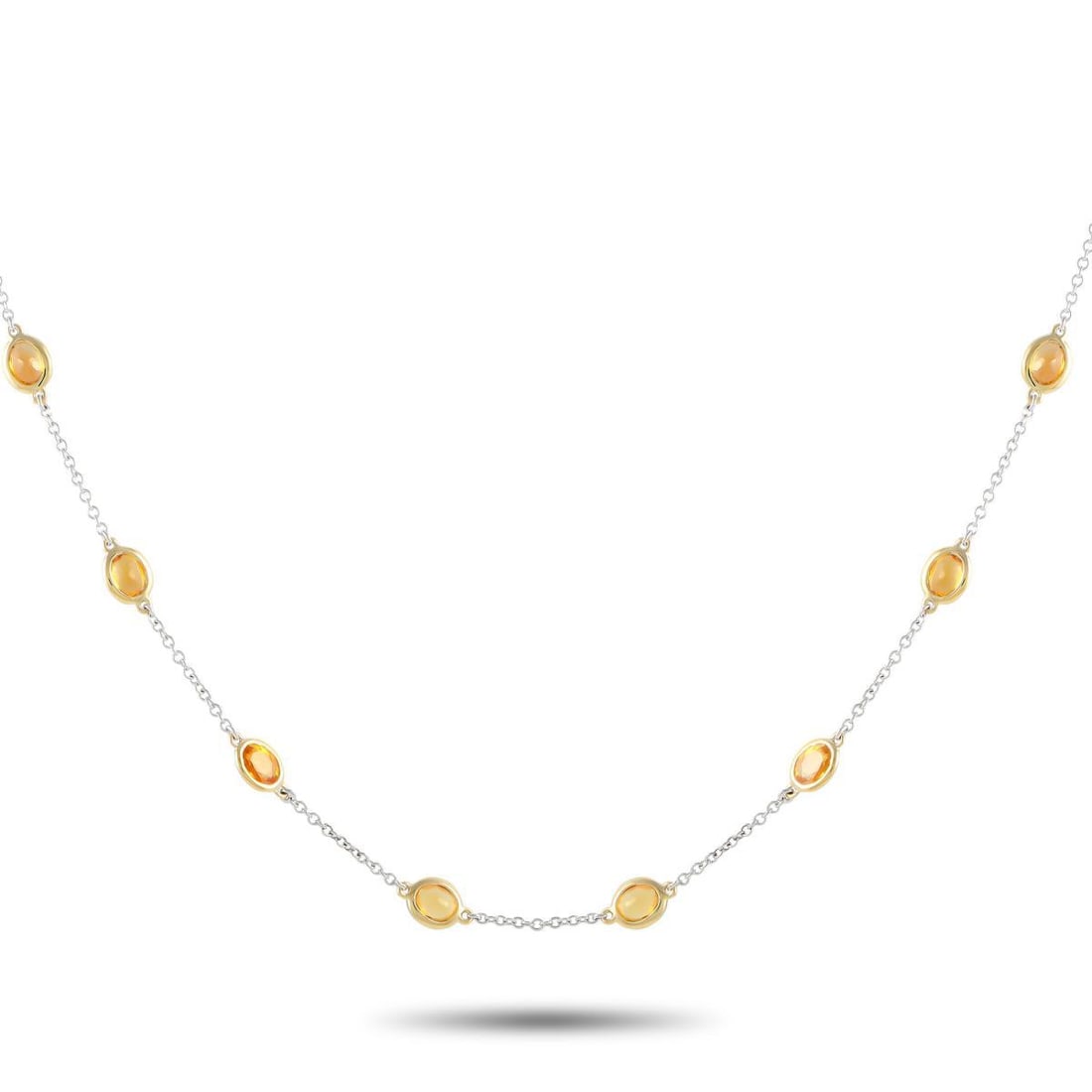 14K White Gold 8.29ct Sapphire Station Necklace: Yellow warm toned Sapphires with a total weight of 8.29 carats make this simple, elegant necklace simply stunning. Ideal for any occasion, its crafted from 14K White Gold and measures 30 long.This jew