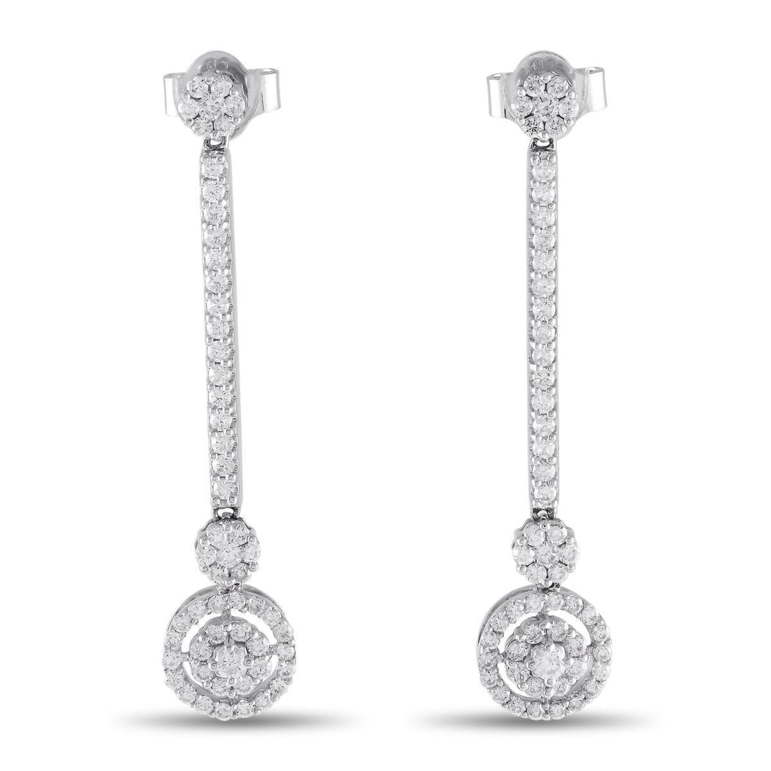 Bucherer 18K White Gold 1.34ct Diamond Dangle Earrings: These white gold sparklers exude an undeniable aura of class and refinement. Made by Bucherer, these drop earrings feature a diamond cluster post secured by a push-back clasp. A vertical line of diamo