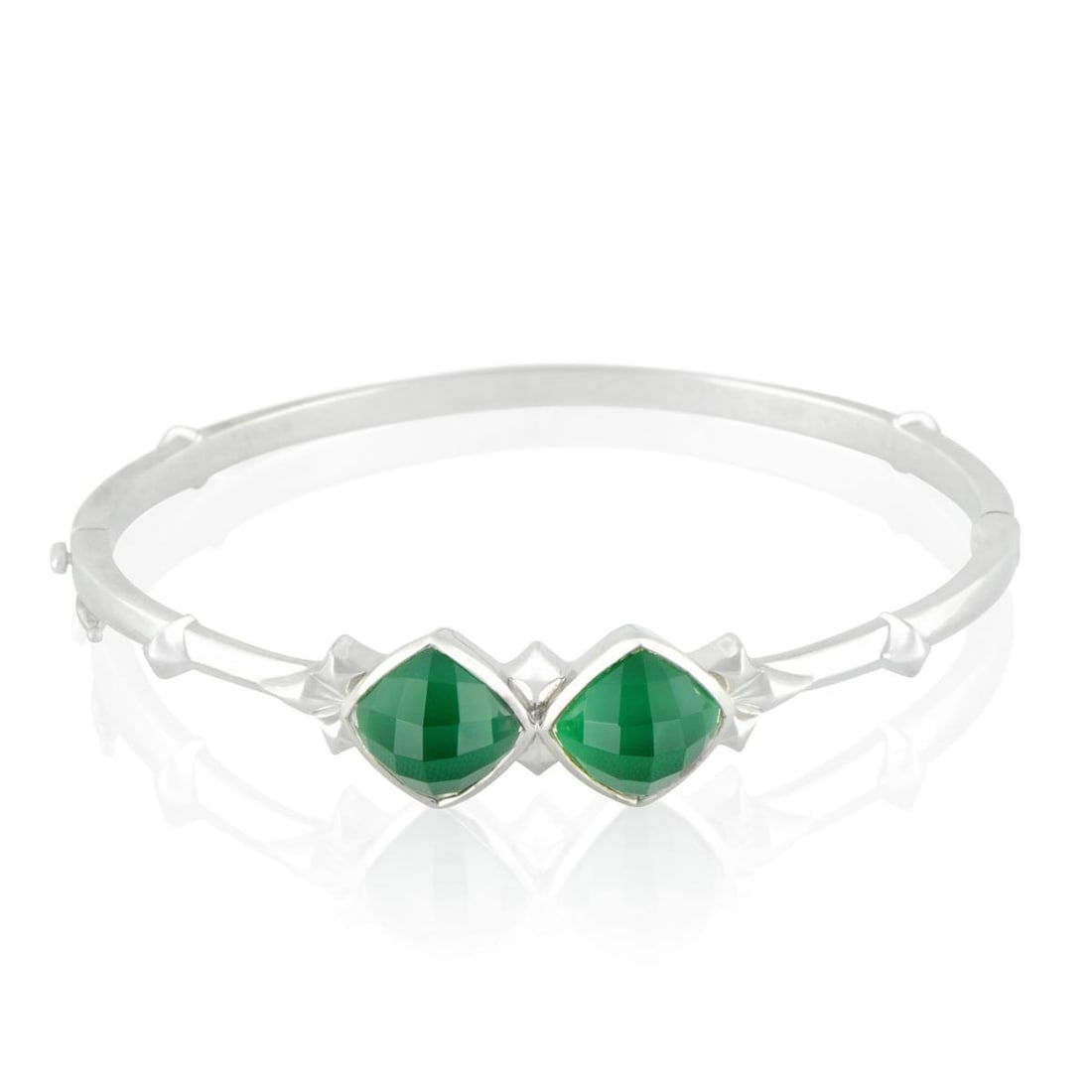 STEPHEN WEBSTER SILVER CHRYSOPRASE AND QUARTZ BANGLE BRACELET: Blending spotless brightness with attractive color, this stunning bangle from Stephen Webster boasts the quintessential Superstud design, made of white rhodium-plated silver and set with appealing syn