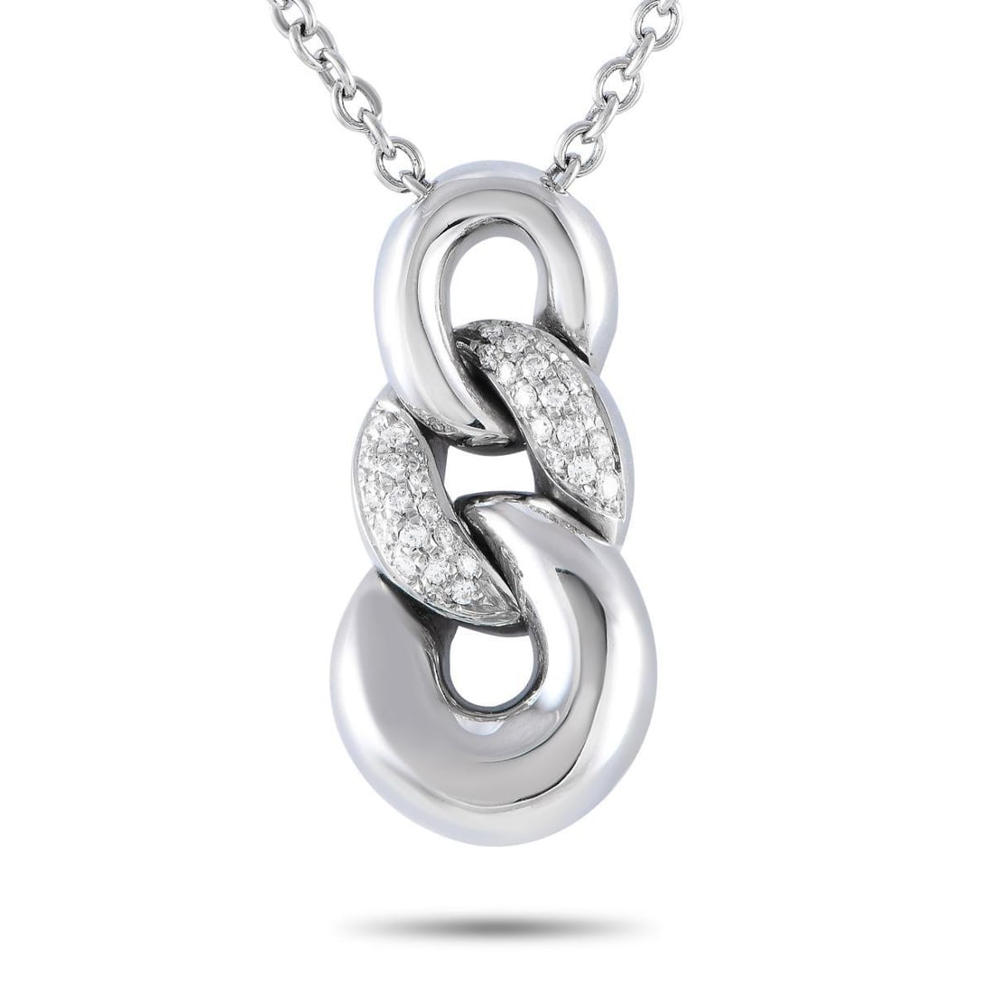 BUCHERER 18K WHITE GOLD 0.35CT DIAMOND CURB LINK PENDANT NECKLACE: A striking 18K white gold pendant measuring 1.25 long by 0.65 wide makes a statement on this exquisite Bucherer necklace. The pendant is accented by sparkling diamonds totaling 0.35 carats and is susp