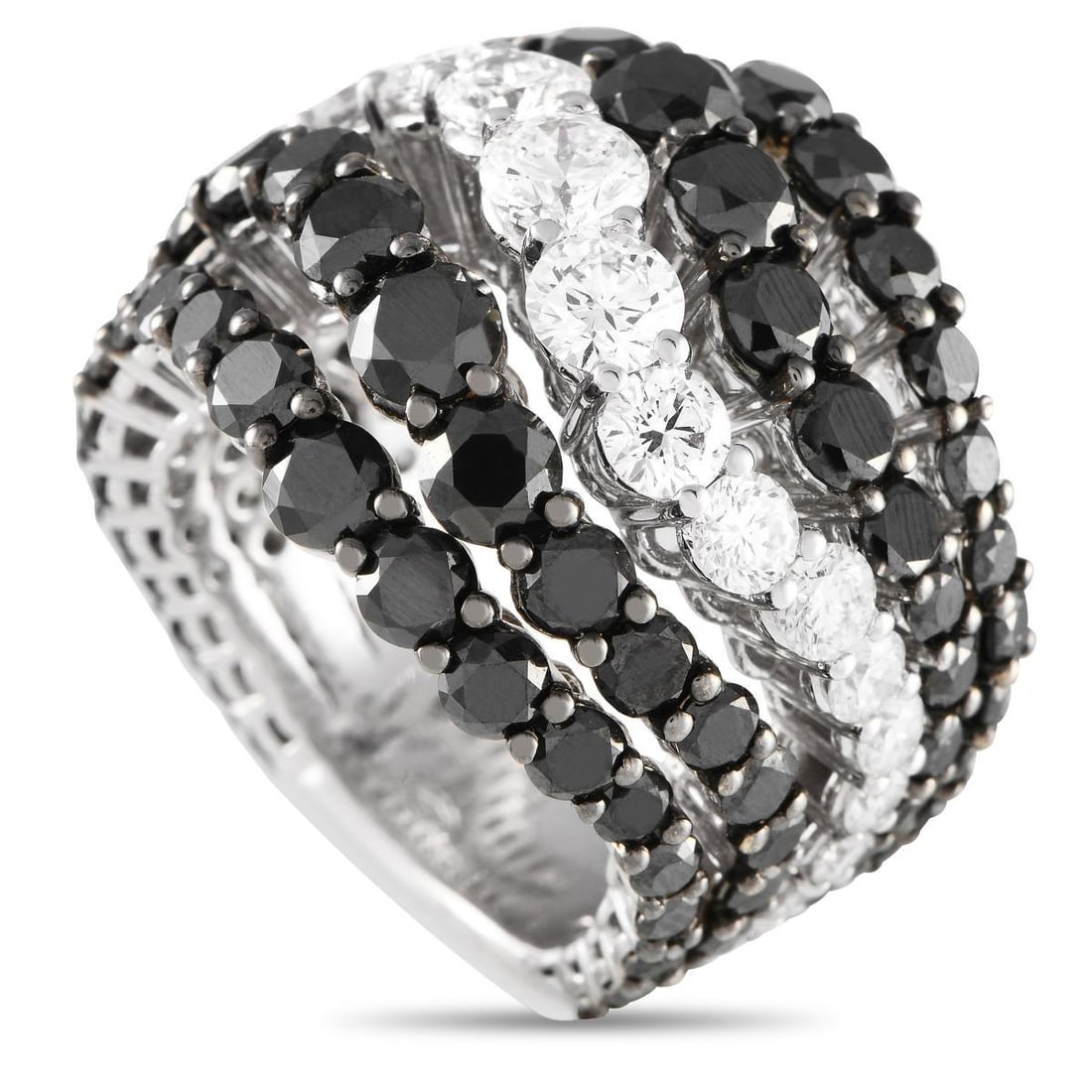 BUCHERER 18K WHITE GOLD 10.86CT BLACK AND WHITE DIAMOND RING: A stunning array of diamonds makes this Bucherer ring simply unforgettable. Alternating bands of black diamonds totaling 8.20 carats and white diamonds totaling 2.66 carats are only elevated by the cu