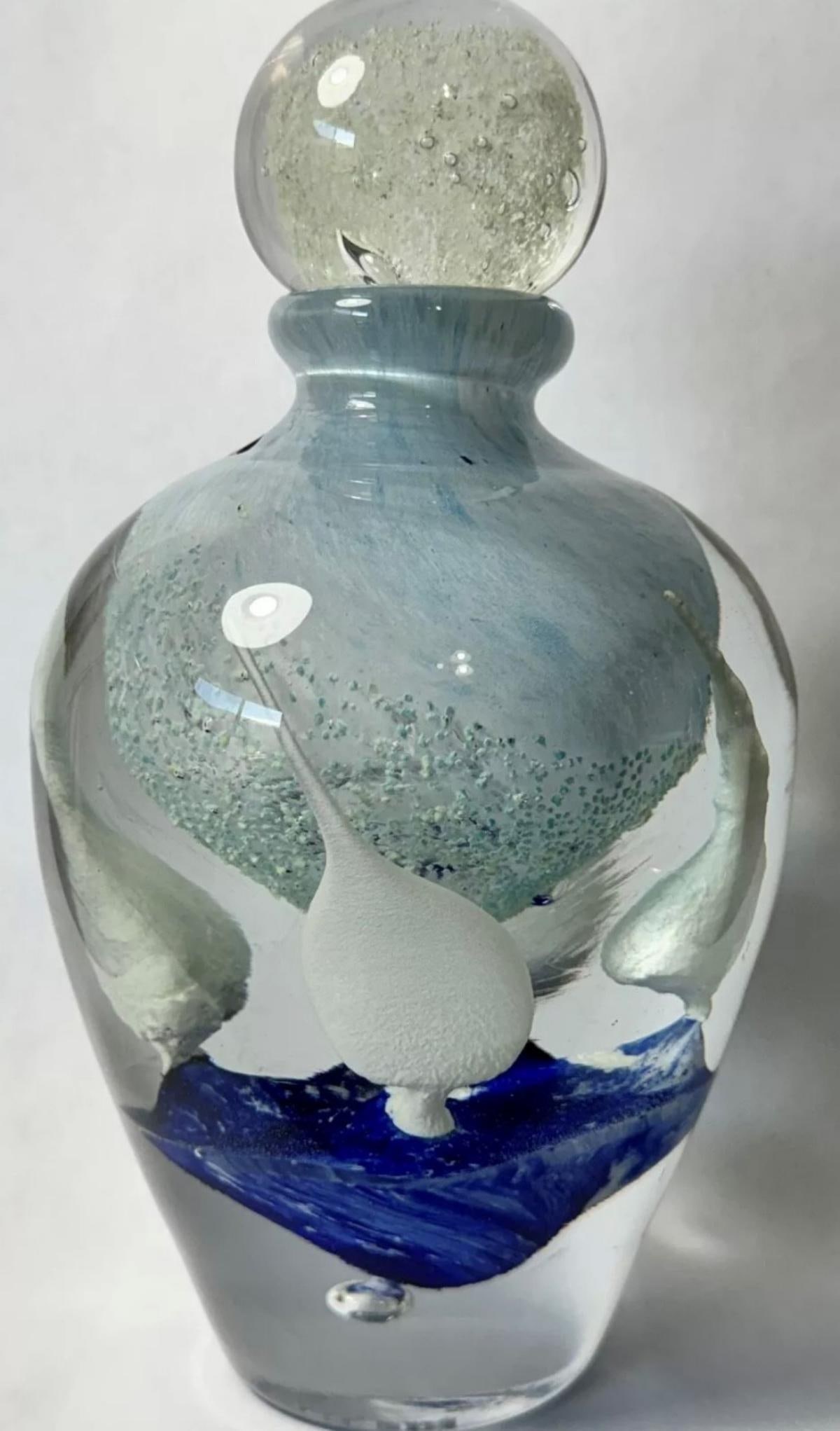 Jean Claude Novaro- Glass Sculpture: Artist: Jean Claude Novaro. Medium: Glass Sculpture. Size: 8" x 5". Signature: Hand Signed. Additional: Glows in the dark. Reference#: 61314.