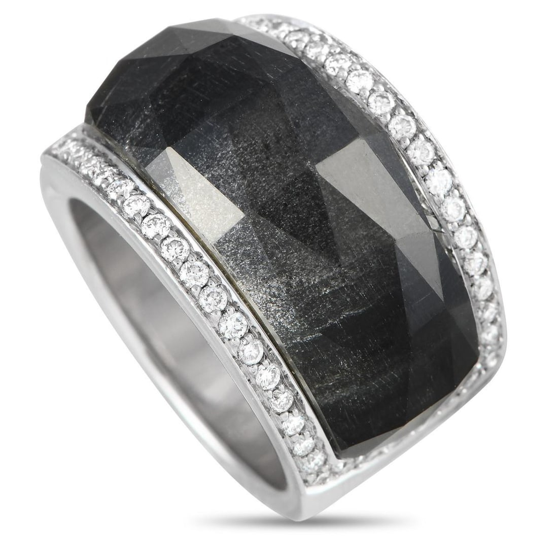 STEPHEN WEBSTER CRYSTAL HAZE 18K WHITE GOLD 0.60CT DIAMOND AND CRYSTAL RING: This Stephen Webster Crystal Haze offers a beautiful combination of colors and textures. A large crystal with a black backing serves as a stunning focal point, while a series of diamonds totaling 0.60