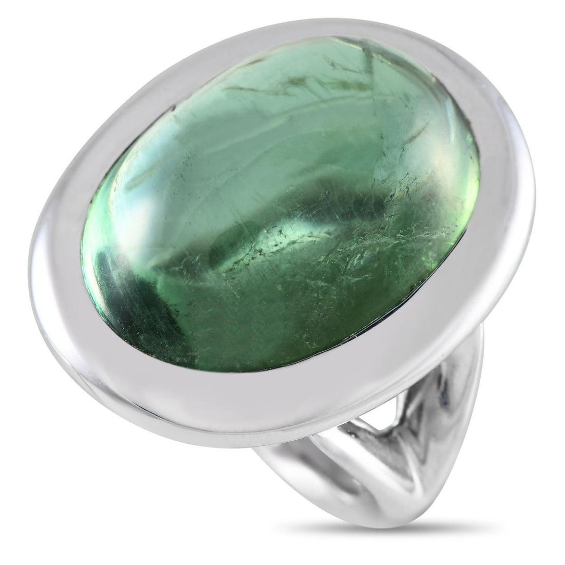 BUCHERER 18K WHITE GOLD 25.69CT TOURMALINE RING: An eye-catching 25.69 carat tourmaline gemstone makes a statement at the center of this impressive Bucherer ring. A minimalist piece that will complement any aesthetic, this pieces 18K white gold sett