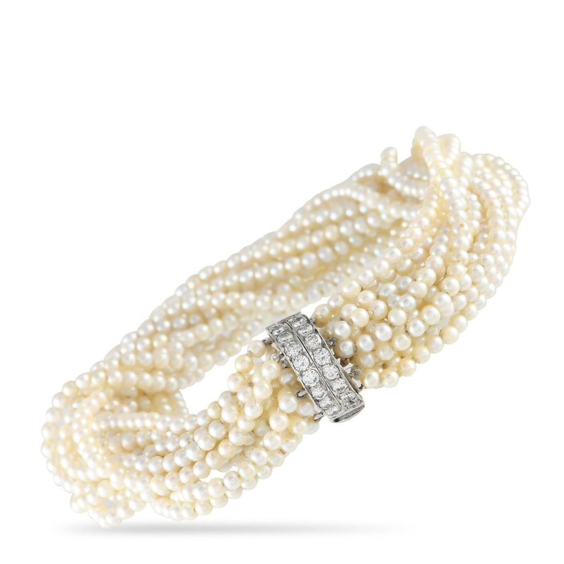 PLATINUM 2.0CT DIAMOND AND PEARL TORSADE BRACELET: As classic as it gets. This beauty features multiple strands of petite pearls ready to adorn your wrist with chic elegance. The lustrous strands are gathered by a diamond-studded platinum clasp that d
