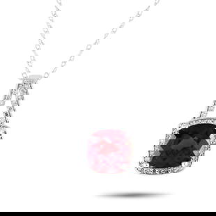 14K WHITE GOLD 0.12CT DIAMOND AND GARNET NECKLACE: Attract wealth, wisdom, and love by wearing this garnet necklace. It bears a deep red ruby gemstone believed to be a symbol of prosperity, sagacity, and passion. The 0.65 by 0.45 pendant has a white g