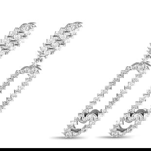 14K WHITE GOLD 0.50 CT DIAMOND DROP EARRINGS: These subtly playful diamond earrings are designed to deliver a sparkle that moves with you. They're crafted in 14K white gold and feature an oval-shaped diamond cluster post with a push-back clasp. D