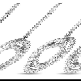 14K WHITE GOLD 1.00CT DIAMOND DROP EARRINGS: Interlocking circular accents make these earrings incredibly captivating. Sparkling diamonds with a total weight of 1.00 carats contrast beautifully against the lustrous 14K white gold settings. Each