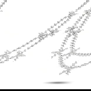 ASPREY DAISY 18K WHITE GOLD 5.76CT DIAMOND NECKLACE: Made by British luxury brand Asprey, this white gold necklace boasts blooming brilliance that's sure to captivate. It features the quintessential English wildflower, the daisy, adorning the necklace's