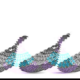 18K WHITE GOLD TURQUOISE AND AMETHYST EARRINGS: Add color to any ensemble with these breathtaking fan-shaped earrings. The dramatic design comes to life thanks to inset Amethyst gemstones. At the center, turquoise cabochons offer delightful contras