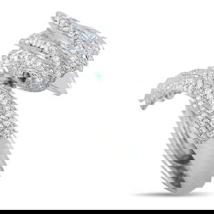 18K WHITE GOLD 0.95CT DIAMOND BIRD RING: Featuring an avian motif, this ring in white gold features a bypass shank with a sculpted bird's head on one end and the tail on the other. Brilliant diamonds adorn the carved design, adding elegance