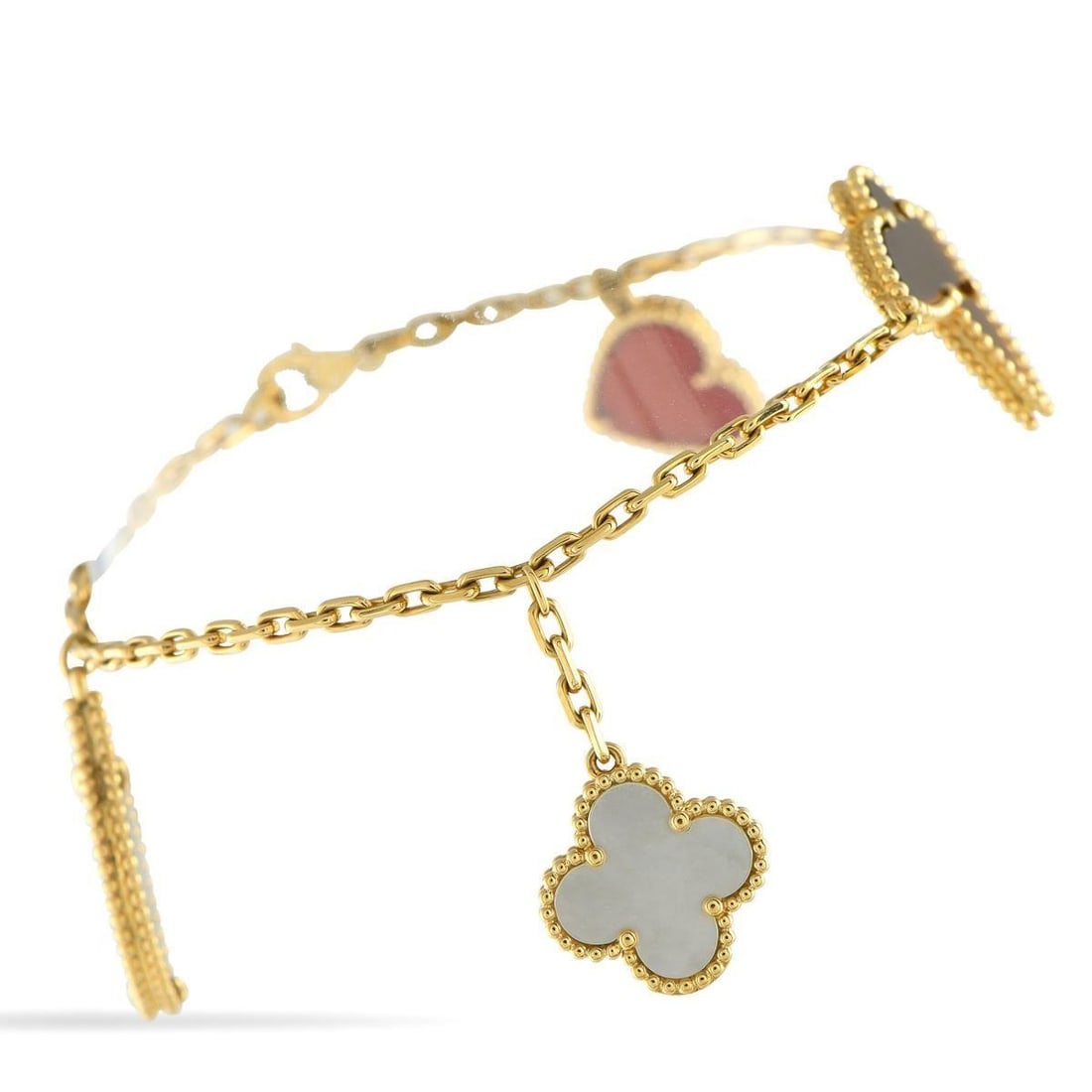 VAN CLEEF & ARPELS LUCKY ALHAMBRA 18K YELLOW GOLD 4-MOTIF BRACELET: Color, meaning, and whimsy come together in this Lucky Alhambra 4-motif bracelet. It features an 18K yellow gold chain measuring 7.5 inches long and fastened by a lobster clasp. Suspending along the c