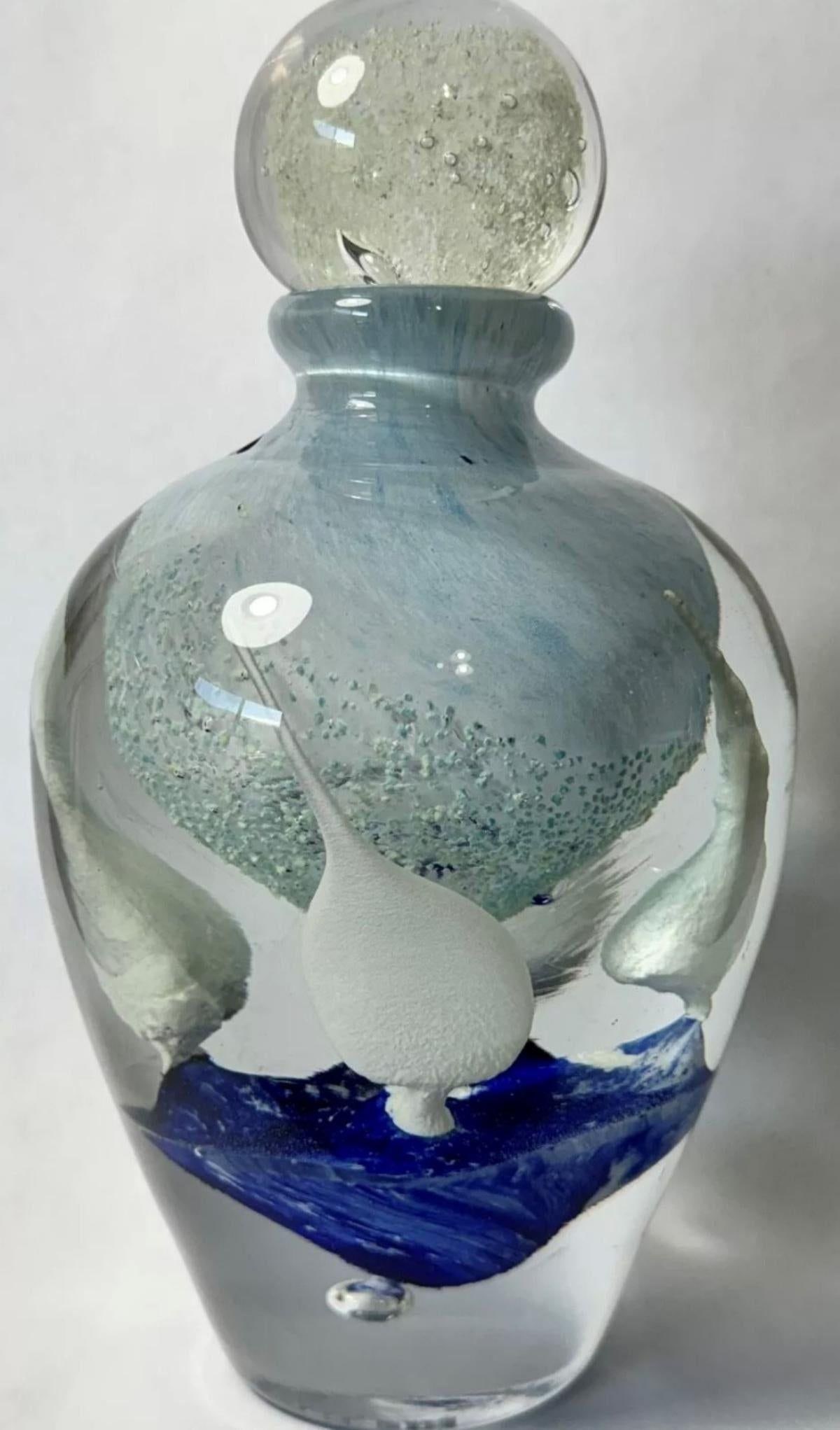 Jean Claude Novaro- Glass Sculpture: Artist: Jean Claude Novaro. Medium: Glass Sculpture. Size: 8" x 5". Signature: Hand Signed. Additional: Glows in the dark. Reference#: 61314.