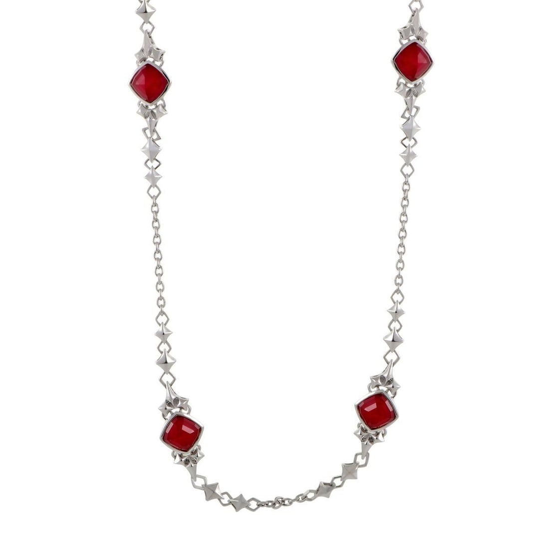 STEPHEN WEBSTER SUPERSTUD WOMENS SILVER CORAL AND QUARTZ NECKLACE: Standing out in brilliant fashion against the wonderfully bright backdrop of white rhodium-plated silver and quartz, the amazing synthesized red coral stones lend their passionate spirit to this marve