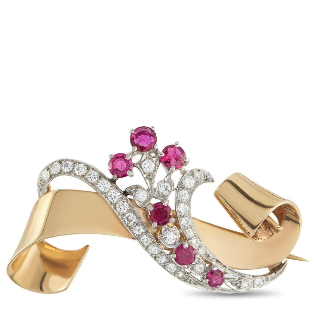 VAN CLEEF & ARPELS VINTAGE 14K ROSE GOLD DIAMOND AND RUBY BROOCH: This vintage Van Cleef & Arpels brooch exudes old fashioned elegance. A ribbon-like 14K Rose Gold accent adds a delicate touch, while the central motif shines to life thanks to inset Diamonds and Ruby