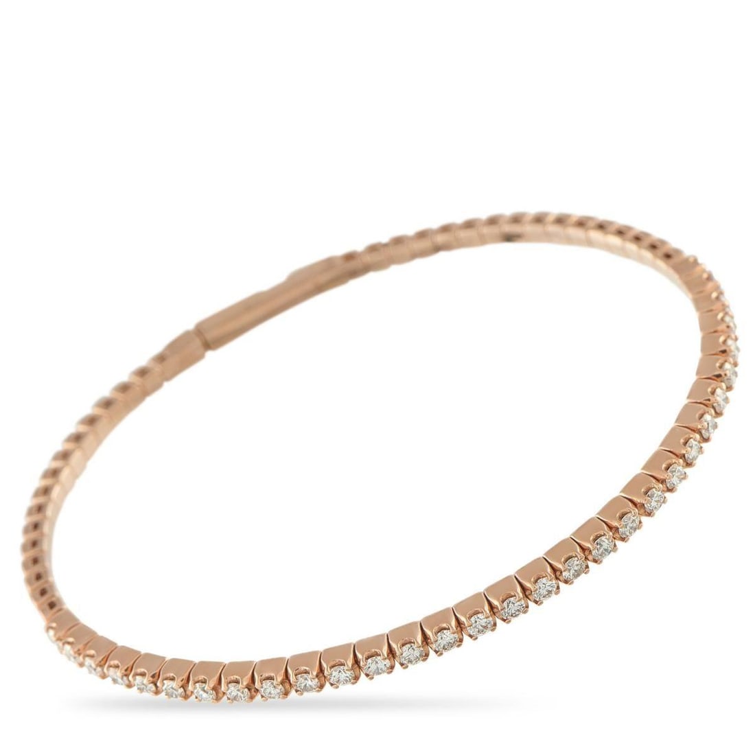 14K ROSE GOLD 1.22CT DIAMOND TENNIS BANGLE BRACELET: Add sparkle to every attire with this rose gold tennis bangle bracelet that transitions effortlessly from desk to dinner. It features a rigid design that keeps the shape sleek and modern, while the wa