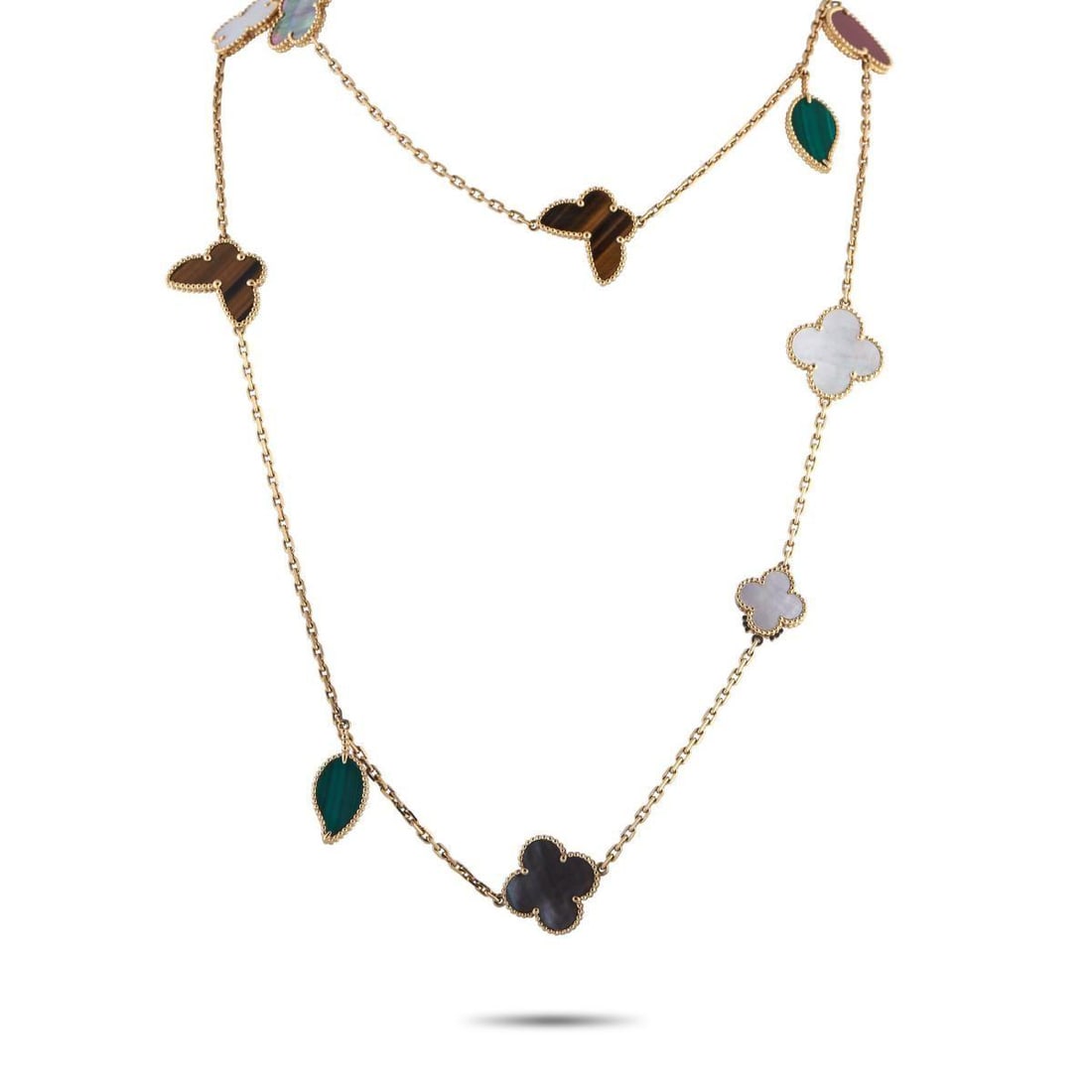 VAN CLEEF & ARPELS LUCKY ALHAMBRA 18K YELLOW GOLD NECKLACE: This Van Cleef & Arpels Lucky Alhambra necklace an exciting addition to any ensemble. Symbols inspired by nature including butterflies, leaves, and the classic clover motif come to life in various pre