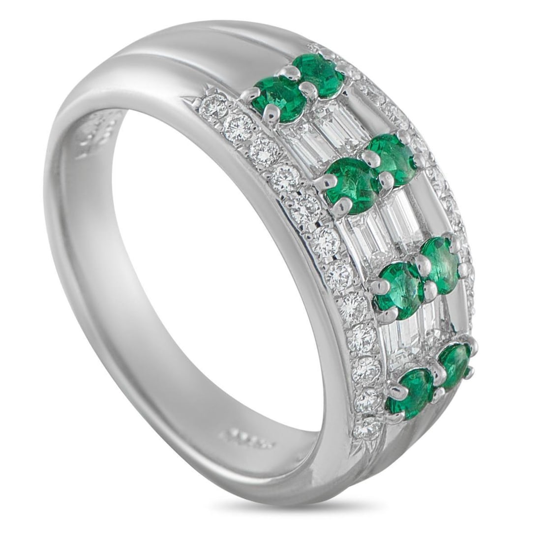 PLATINUM 0.66CT DIAMOND AND EMERALD RING: An ring that charms with its geometric, Art Deco elegance. The platinum band widens at the center, creating a defined canvas for the elaborate setting. The top surface showcases four striking duos of