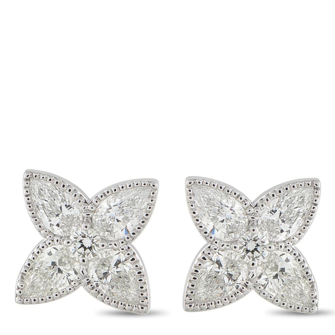 18K WHITE GOLD 2.81CT DIAMOND QUATREFOIL STUD EARRINGS: Small in scale but confident in presence. These white gold studs feature pear-cut diamonds punctuating each lobe of their quatrefoil shape. Milgrain borders add texture, highlighting the elegant silho