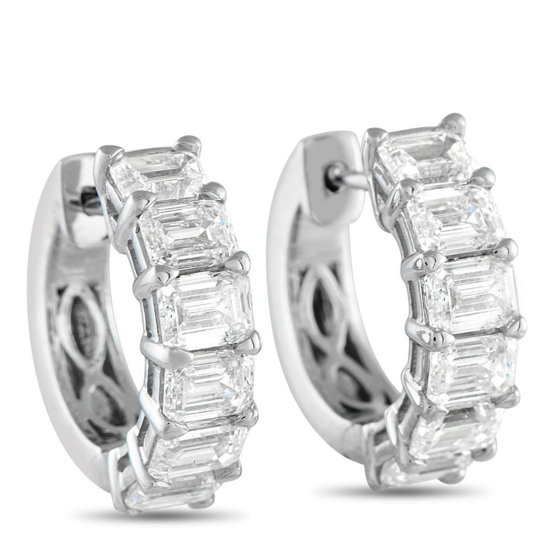18K WHITE GOLD 3.85CT DIAMOND HUGGIE HOOP EARRINGS: Step-cut Diamonds with a total weight of 3.85 carats make these earrings shine brightly every time they catch the light. Simple and sophisticated, the understated 18K White Gold setting makes them an