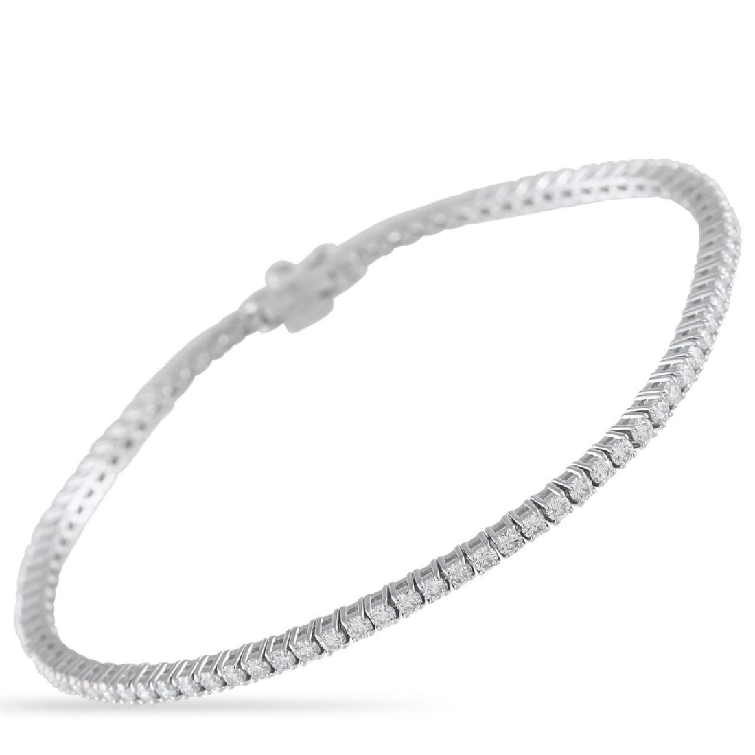 18K WHITE GOLD 2.71CT DIAMOND TENNIS BRACELET: This tennis bracelet is ideal for anyone who appreciates quiet luxury. Classically elegant and timeless in design, it effortlessly catches the light thanks to stunning series of Diamonds totaling 2.71