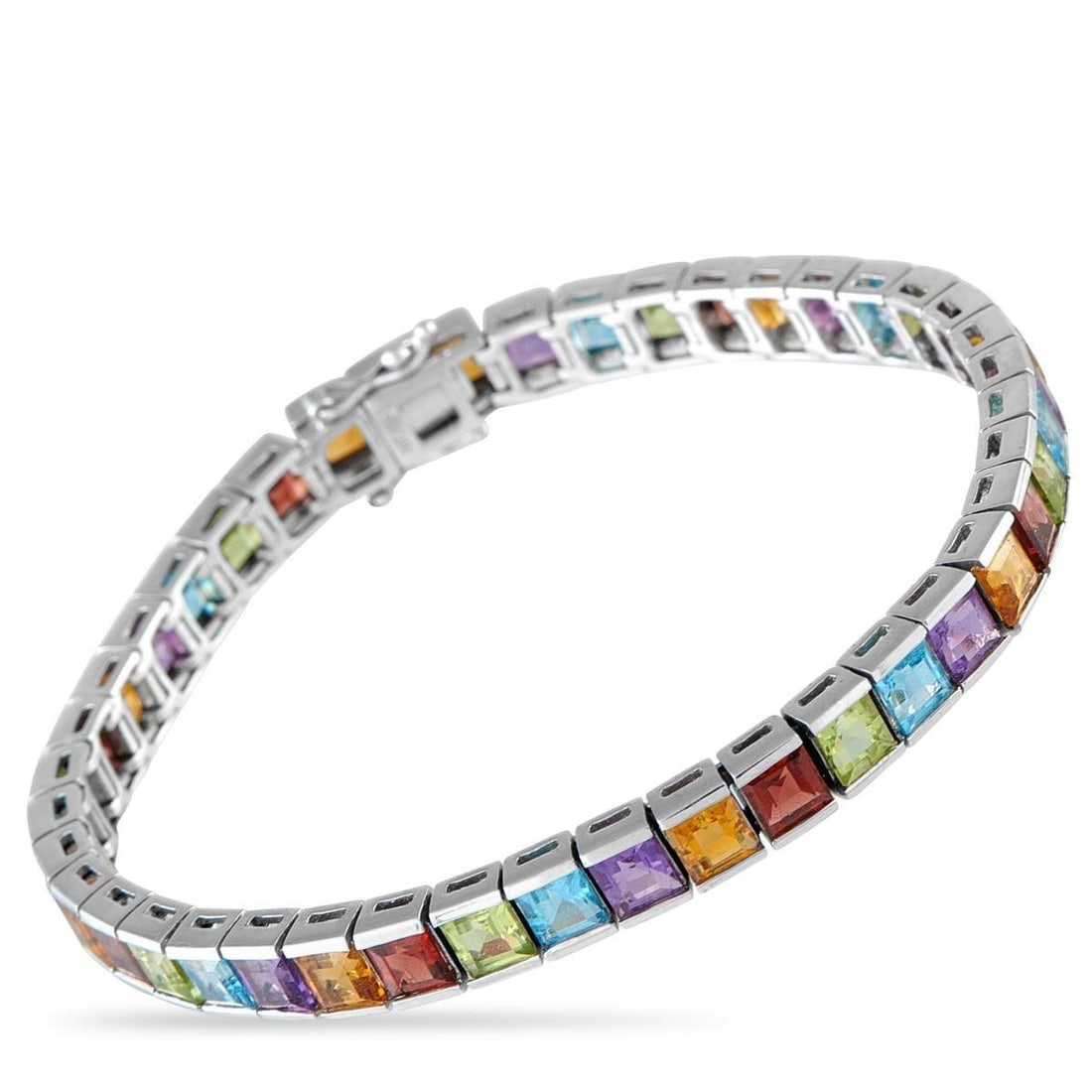 18K WHITE GOLD MULTI-COLORED GEMSTONE LINE BRACELET: An piece offering a playful twist on the classic diamond tennis bracelet. Set with a vibrant mix of semi-precious stones, this white gold bracelet is a fun and fresh alternative for those who love a l