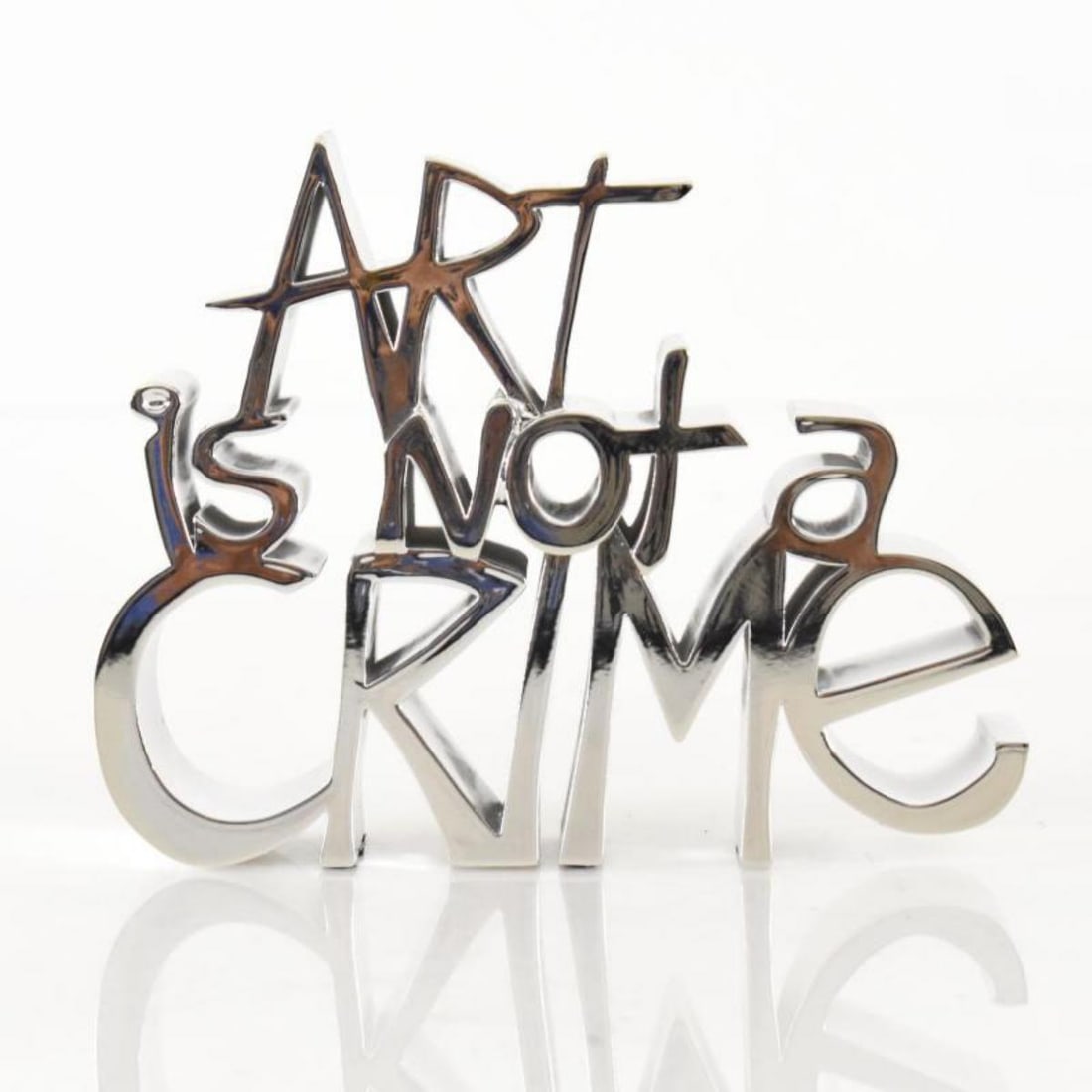 Mr. Brainwash- Resin Sculpture "Art Is Not a Crime (Silver)": Artist: Mr. Brainwash. Medium: Resin Sculpture. Title: Art Is Not a Crime (Silver). Size: 8" x 6.5". Signature: Hand Signed and Numbered by the artist. Certificate of Authenticity: Is included. Additi