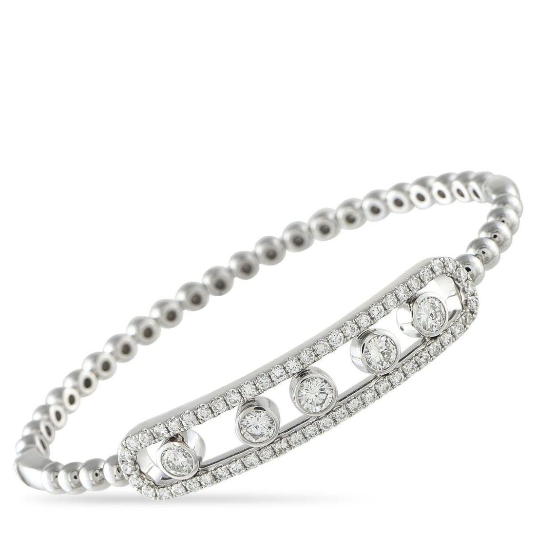 14K WHITE GOLD 2.10CT DIAMOND BRACELET: This 14K white gold bracelet brings a contemporary spin to the classic rigid bangle silhouette. It features a beaded white gold frame for texture and presence, detailed with an elongated track in fron