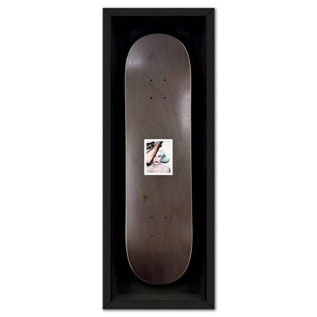 Andy Warhol (1928-1987), "Self-Portrait (Grey)" Framed One-of-a-Kind Unique Edition Skateboard,: Self-Portrait (Grey) is a one-of-a-kind unique edition skateboard by Andy Warhol (1928-1987), bearing the plate signature inverso of the artist. This piece comes custom framed. This piece is from a un