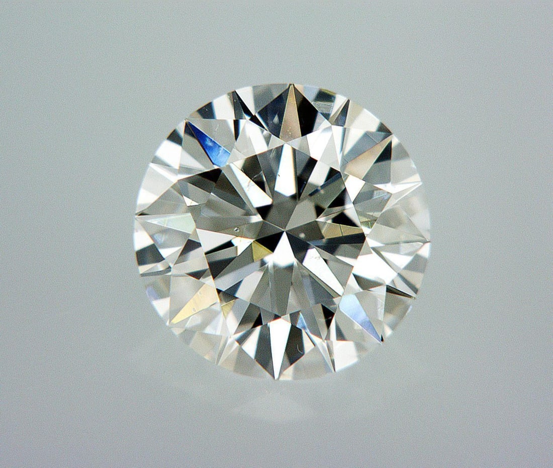 Natural 0.7 ct, Color D/SI1 GIA Graded Diamond: Lab/Natural Diamond: Natural Carat Weight: 0.7 Color Grade: D Clarity Grade: SI1 Model: Round Brilliant Fluorescence: Medium Blue Polish: Excellent Symmetry: Good Size: 5.62 - 5.69 X 3.49 Certificate