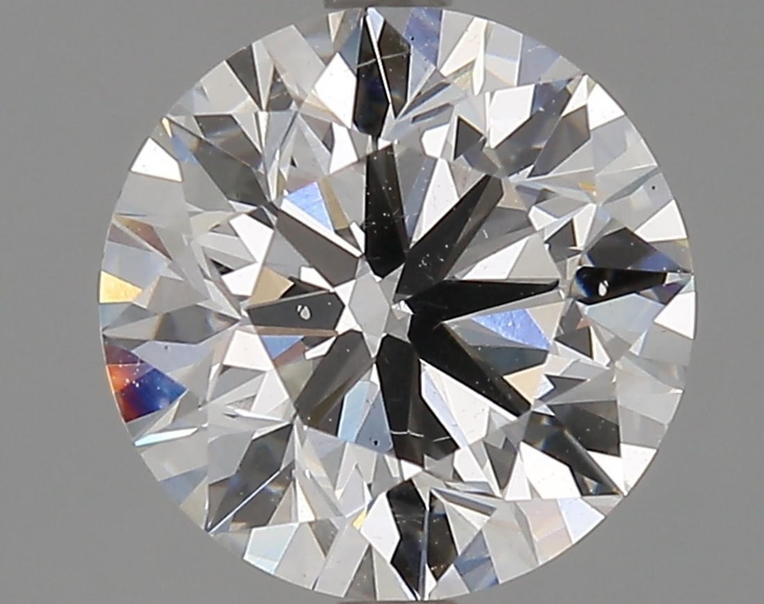 Lab Grown 3 ct, Color E/VS2 IGI Graded Diamond: Lab/Natural Diamond: Lab Carat Weight: 3 Color Grade: E Clarity Grade: VS2 Model: Round Brilliant Fluorescence: None Polish: Excellent Symmetry: Excellent Cut Grade: Ideal Size: 9.16 - 9.21 X 5.72 Cer