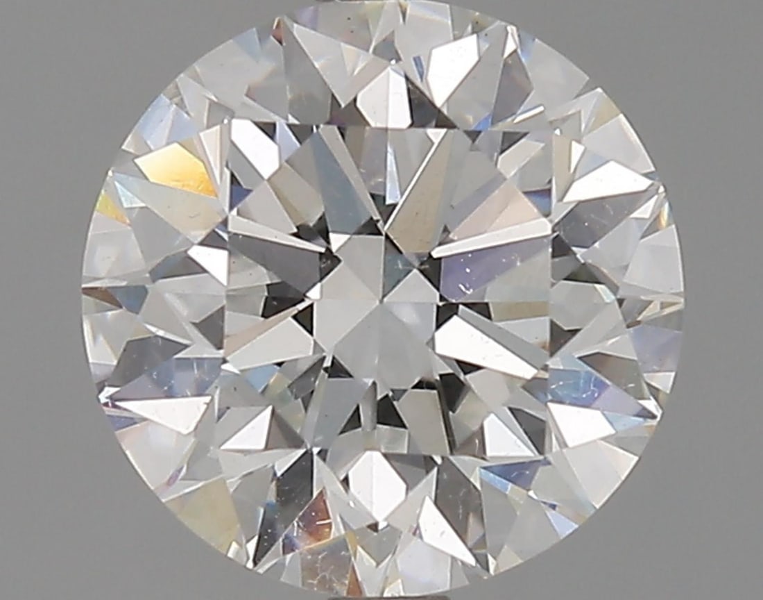 Lab Grown 1.02 ct, Color E/VS1 IGI Graded Diamond: Lab/Natural Diamond: Lab Carat Weight: 1.02 Color Grade: E Clarity Grade: VS1 Model: Round Brilliant Fluorescence: None Polish: Excellent Symmetry: Excellent Cut Grade: Ideal Size: 6.50 - 6.55 X 3.99