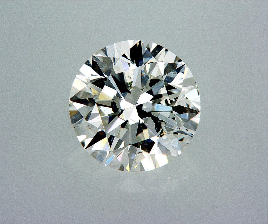 Natural 1 ct, Color G/SI3 GIA Graded Diamond: Lab/Natural Diamond: Natural Carat Weight: 1 Color Grade: G Clarity Grade: SI3 Model: Round Brilliant Fluorescence: Faint Polish: Excellent Symmetry: Excellent Cut Grade: Excellent Size: 6.33 - 6.38 x