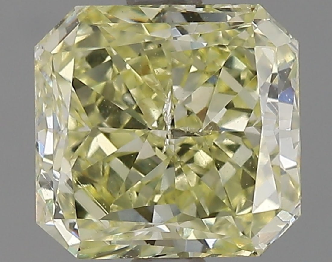 Natural 1.58 ct, Color Fancy Yellow/ GIA Graded Diamond: Lab/Natural Diamond: Natural Carat Weight: 1.58 Color Grade: Fancy Yellow Clarity Grade: Model: Cut-Cornered Rectangular Modified Brilliant Size: 6.81 x 6.50 x 4.00 Certificate Number: 1216309532 Cert
