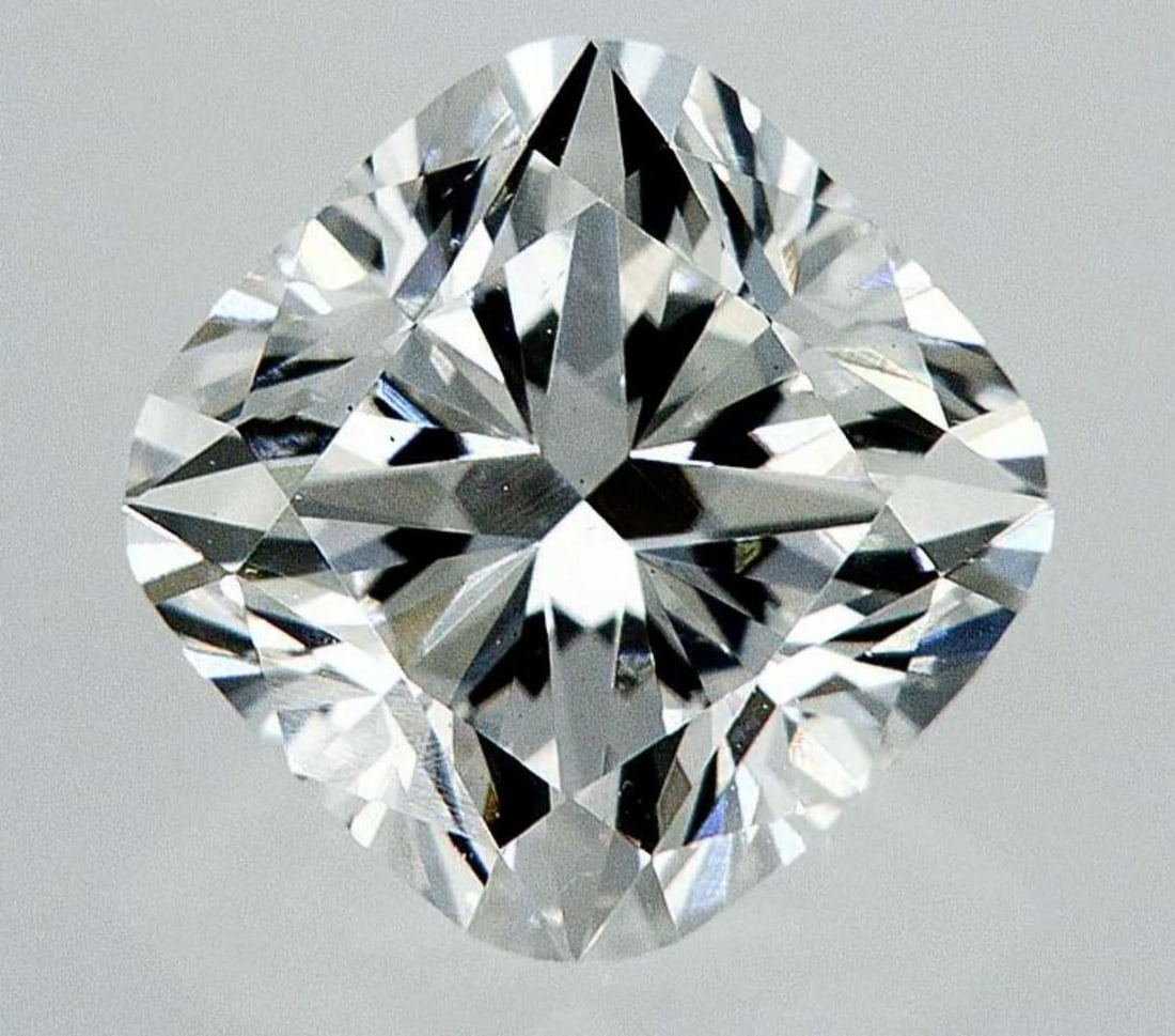 Lab Grown 1.28 ct, Color E/VS2 IGI Graded Diamond: Lab/Natural Diamond: Lab Carat Weight: 1.28 Color Grade: E Clarity Grade: VS2 Model: SQUARE CUSHION MODIFIED BRILLIANT Fluorescence: None Polish: Excellent Symmetry: Excellent Size: 6.23 X 6.23 X 4.29